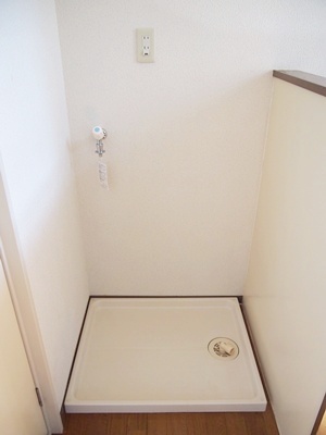 Other room space. Washing machine in the room