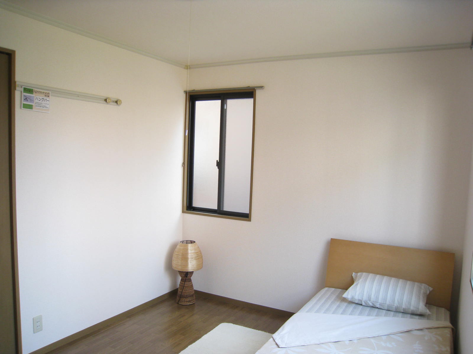 Other room space. The photograph is a 103, Room.