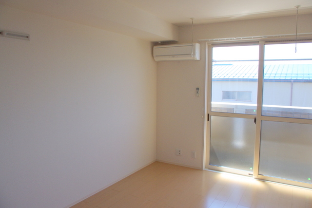 Living and room. The photograph is a separate, Room