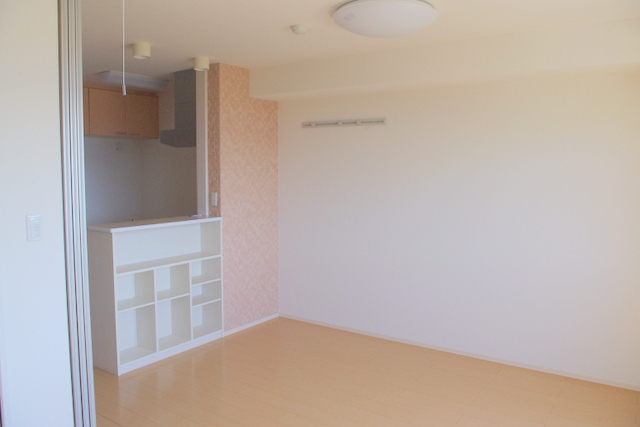 Living and room. The photograph is a separate, Room