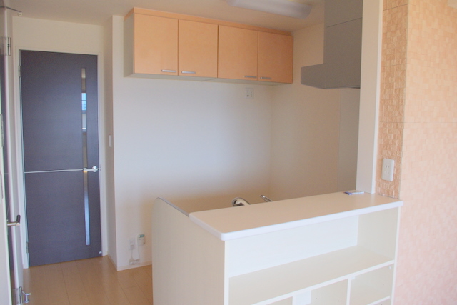 Living and room. The photograph is a separate, Room