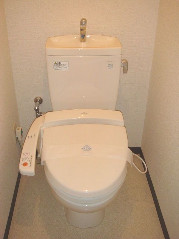 Toilet. Washlet is with