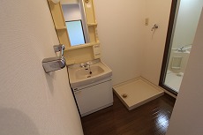 Washroom. Of course, independent wash basin for washing machine inside the yard