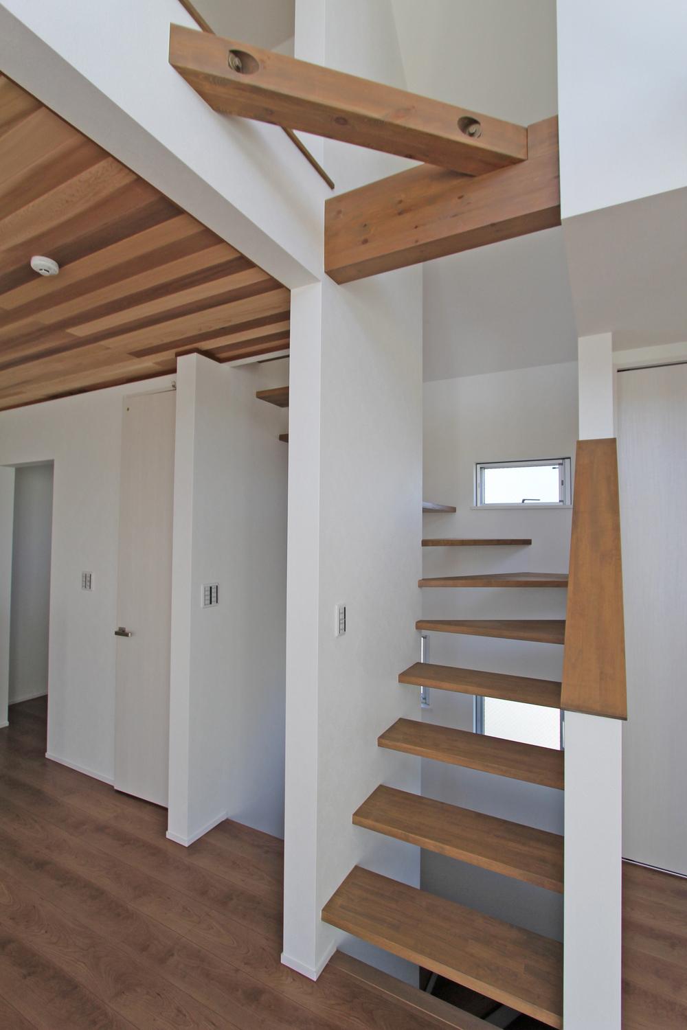 Model house photo. Approach to the loft Skeleton stairs Example of construction