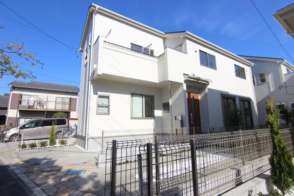 Local photos, including front road. 1 Building ~ We completed.