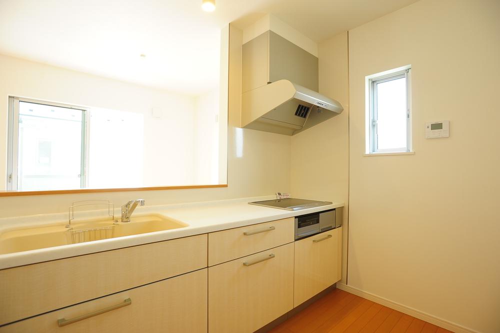Kitchen. Bright open kitchen facing the balcony.