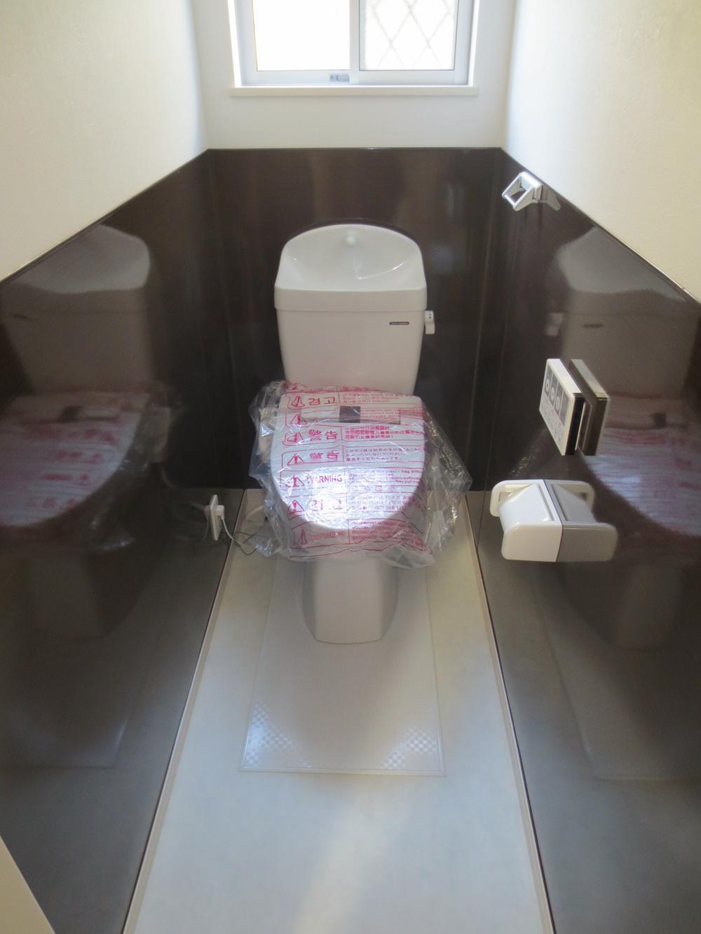 Toilet. Takara toilet with enamel panel. Cleaning also I know Ease.