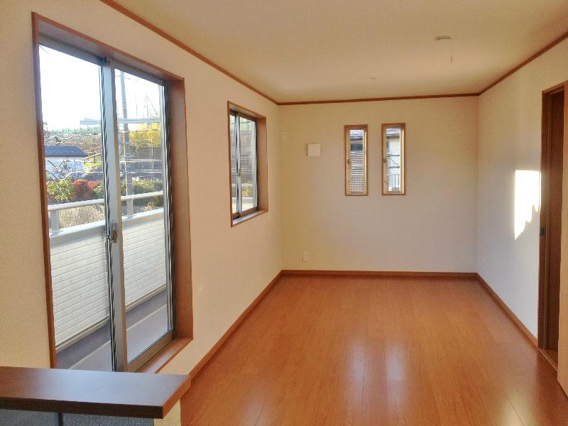 Living. South-facing second floor living! There windows many airy