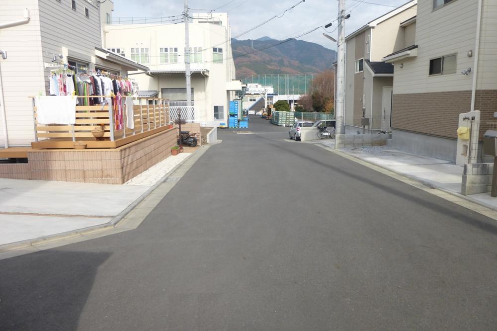Local photos, including front road. 1 Building front road