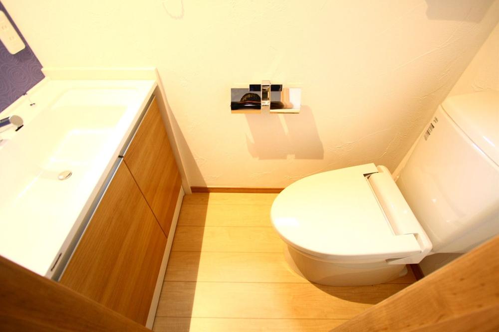 Toilet. Wash basin is located in the toilet.