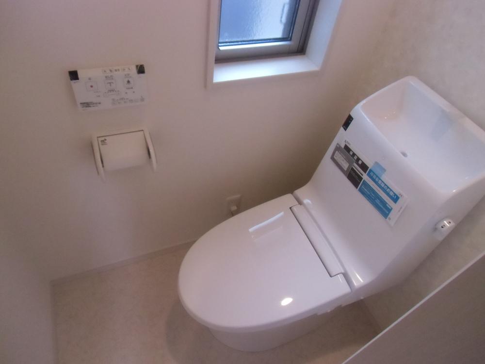 Toilet. Window with integrated toilet