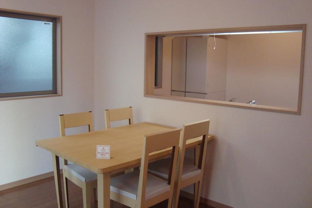 Living. It exhibited a table model made of paper.