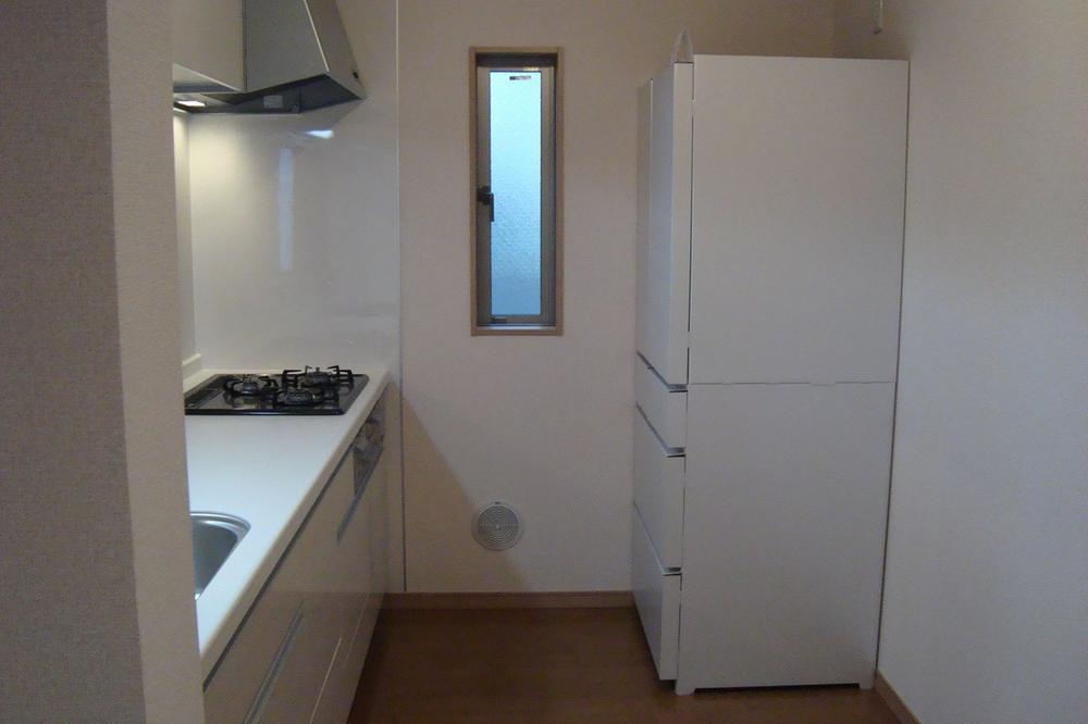 Kitchen. There is a window in the kitchen.