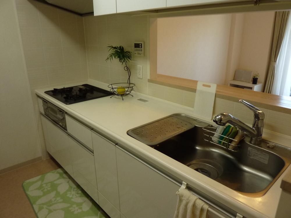 Kitchen. Living is the counter kitchen with a bright and airy with views.