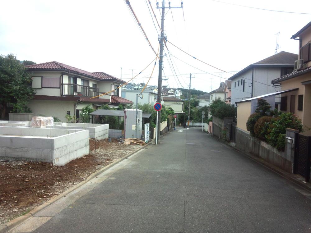 Local appearance photo. South 6m road surface ・ Good per sun ・ Flat 35S ・ Ground guarantee 10 years