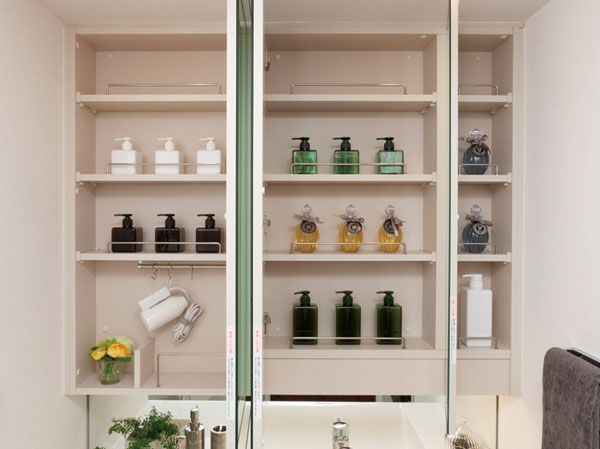 Bathing-wash room. Three-sided mirror back storage of large capacity