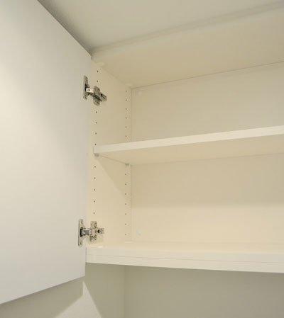 Bathing-wash room.  [Toilet hanging cupboard]  Installation convenient hanging cupboard for storage, such as toilet paper and accessories.