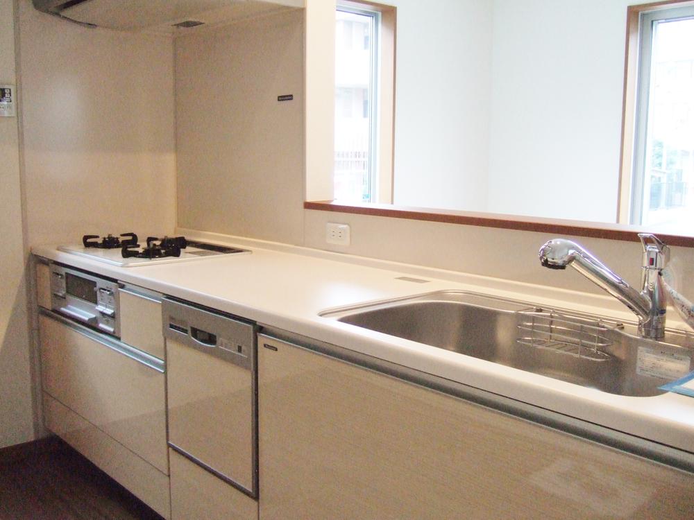 Kitchen. Face-to-face kitchen with a dishwasher