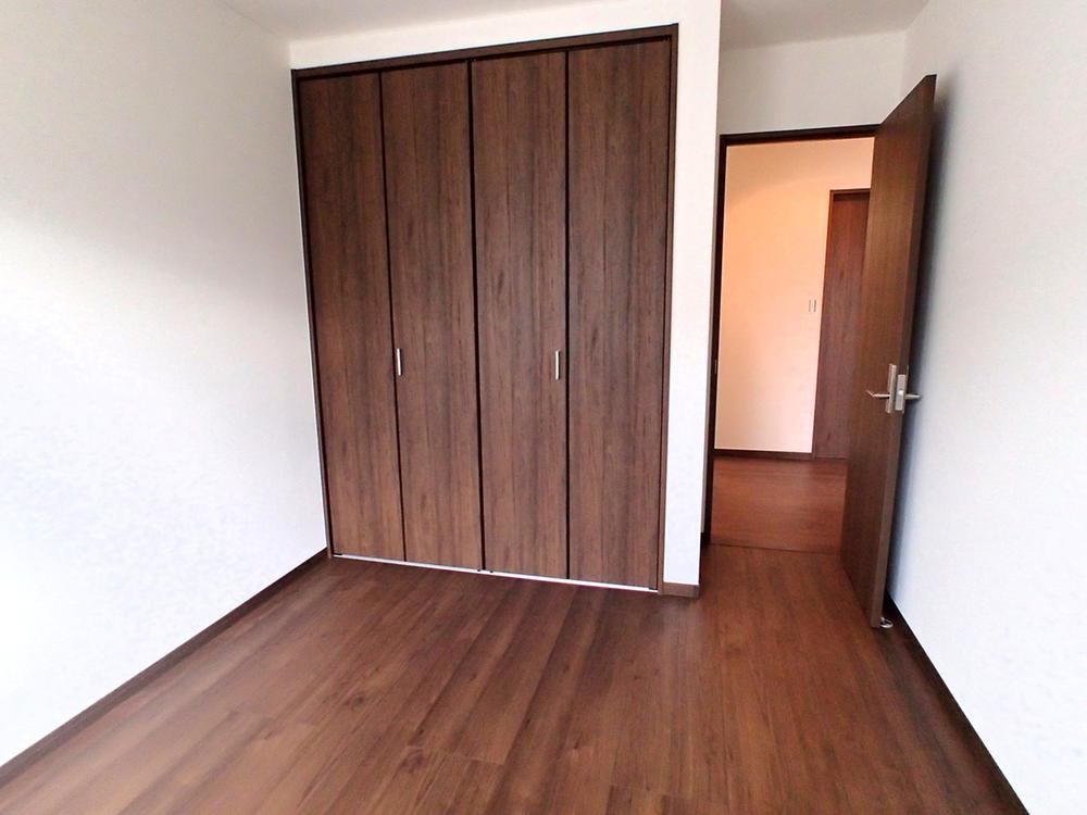 Non-living room. Comfortable could live likely with plenty of storage space