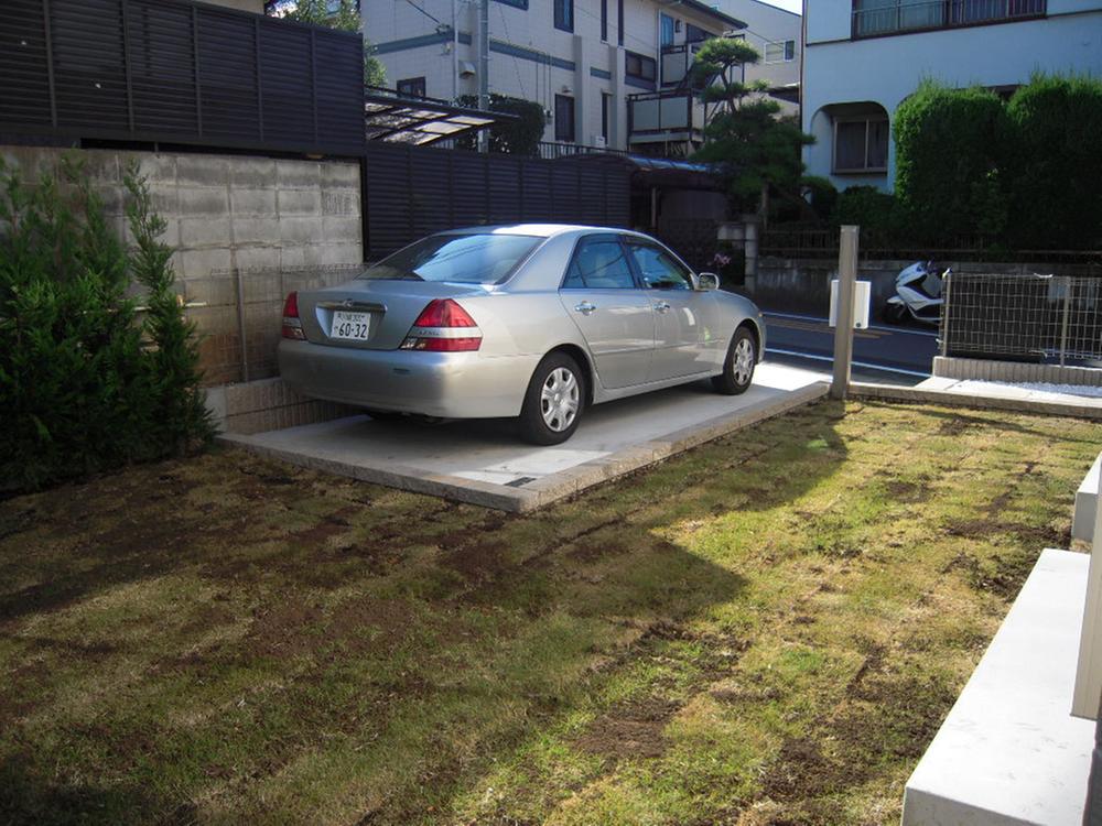 Parking lot. You also can park two cars smashed garden