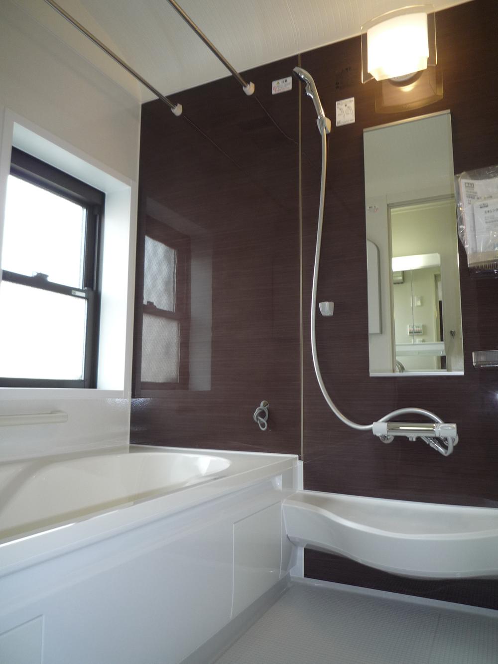 Bathroom. Unit is a bus with a bathroom ventilation dryer.