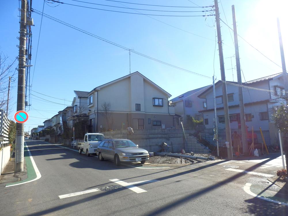 Local photos, including front road. Building 2 parallel two available parking room of car spaces