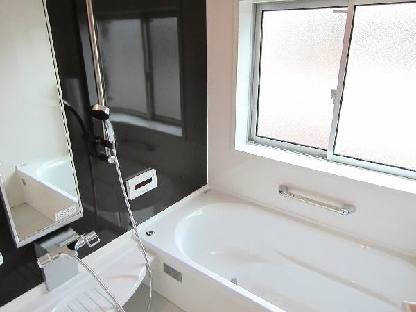 Bathroom. Is a bathroom with bright sun shine through the window.