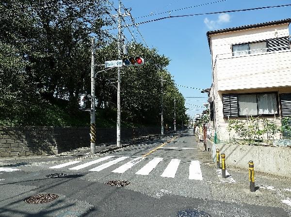 Local appearance photo. Station bound is bright and wide road with a sidewalk
