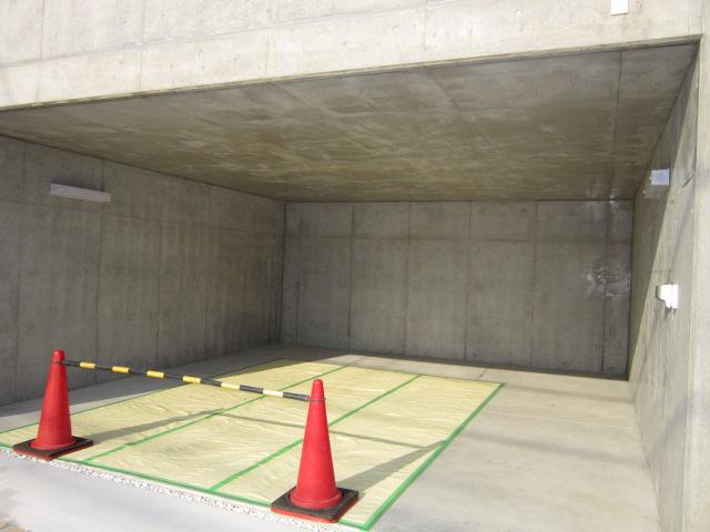 Parking lot. Why do not you put two of the car in the basement garage with a roof.