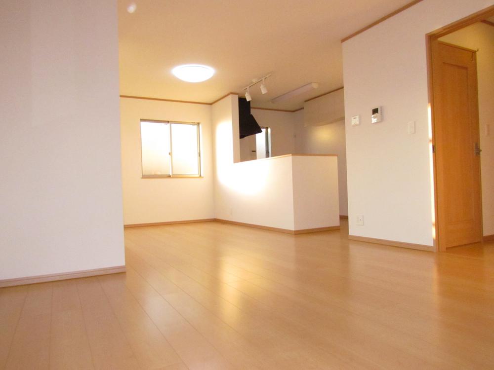 Living. It overlooks one side living room from the kitchen