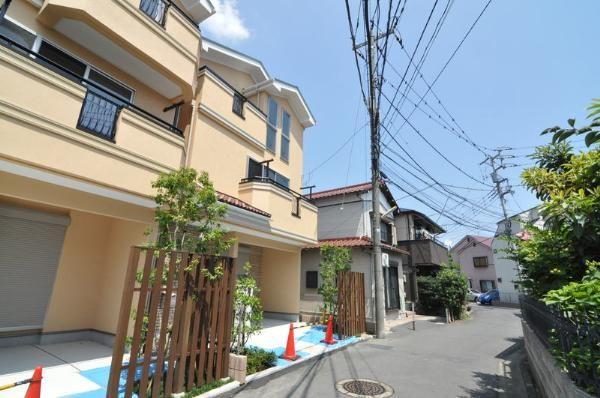 Local appearance photo. There is a sense of relief there is adjacent land dedicated passage on the east side.