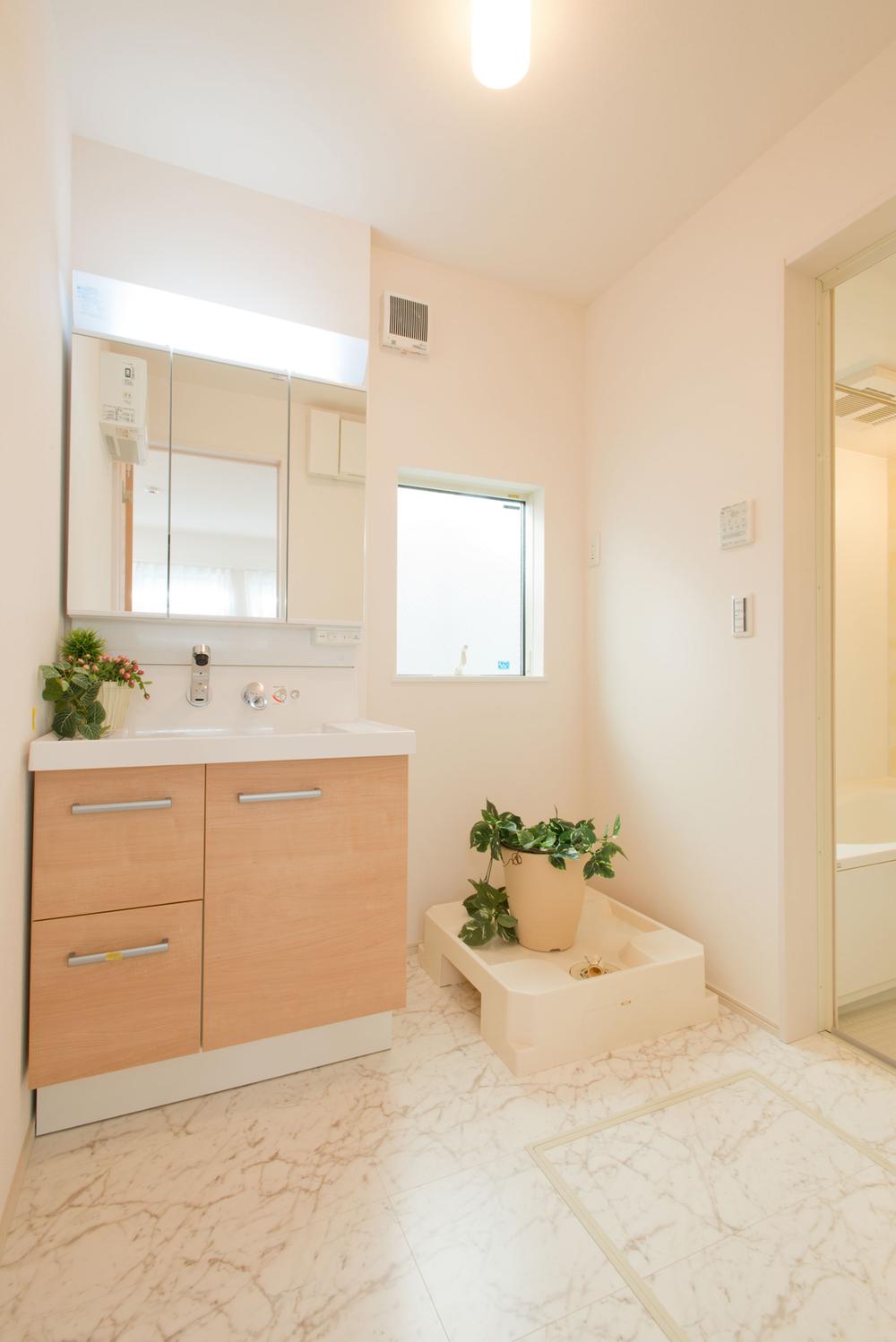 Wash basin, toilet. Model house Second floor Wash ・ State of the undressing room