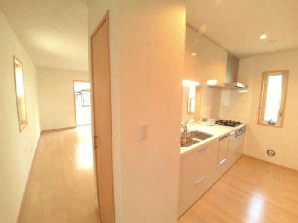 Kitchen. Living room overlooks