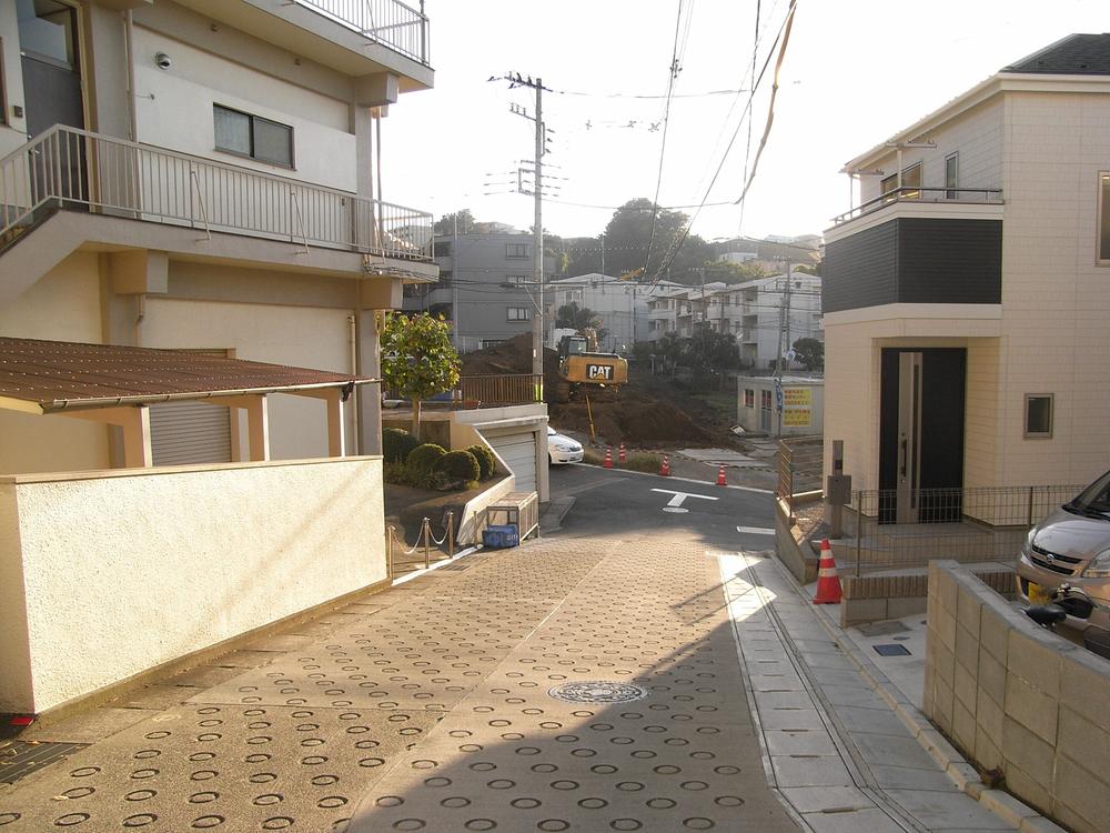 Local photos, including front road. Is a 2-minute walk to the bus stop!