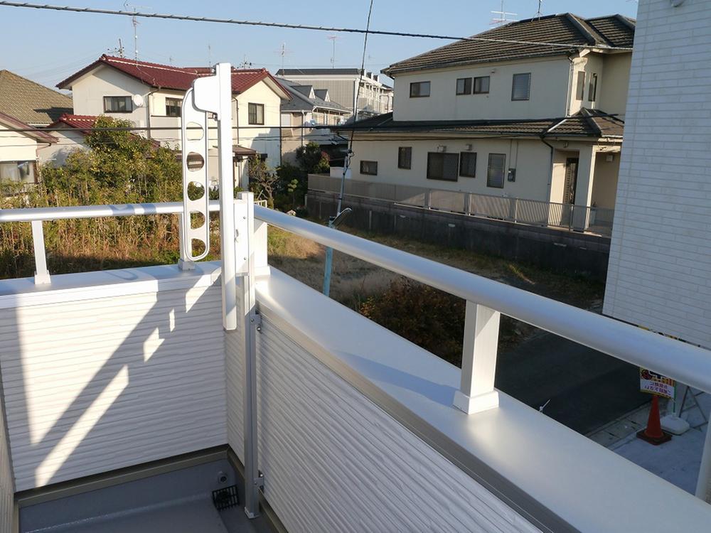 Balcony. Sunny. With clothes hook