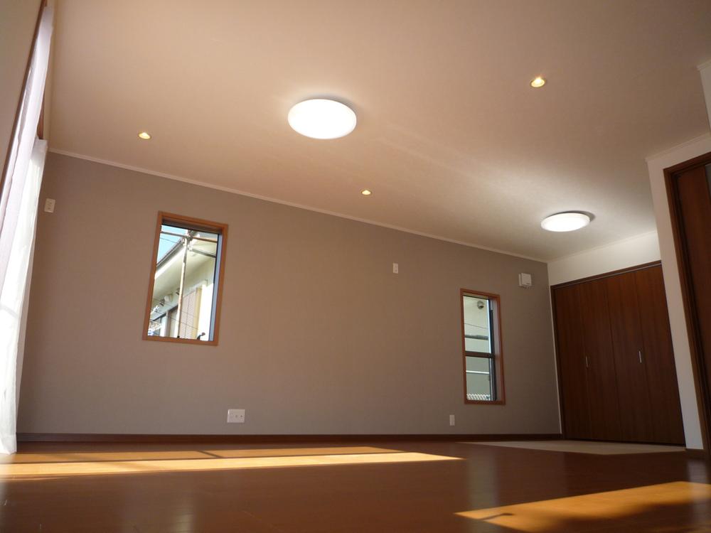 Living. It is living bathed in bright sunshine.  (Photo 1 Building)