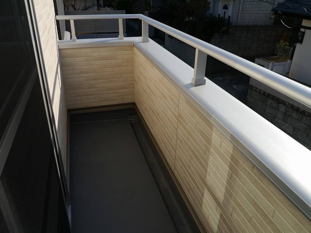 Balcony. Sunny. With clothes hook