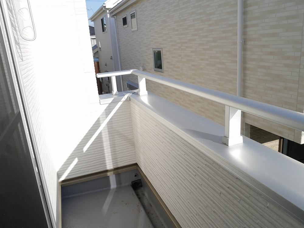 Balcony. Sunny. With clothes hook