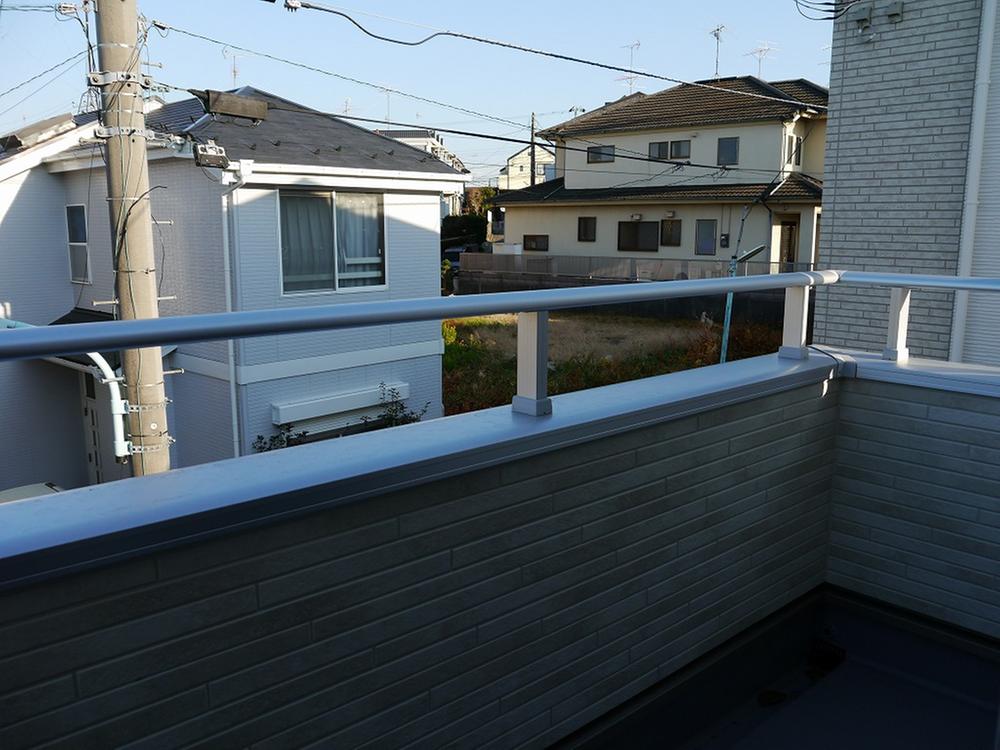 Balcony. Sunny. With clothes hook