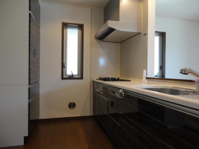 Kitchen. 1 Building Kitchen. The color depends on the Building. The kitchen has become a gas stove, It is very convenient because it is also equipped with a dishwasher.