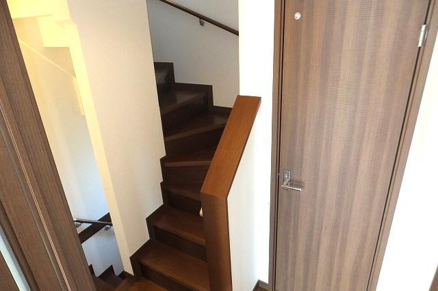 Non-living room. Stairs are partitioned with the living.