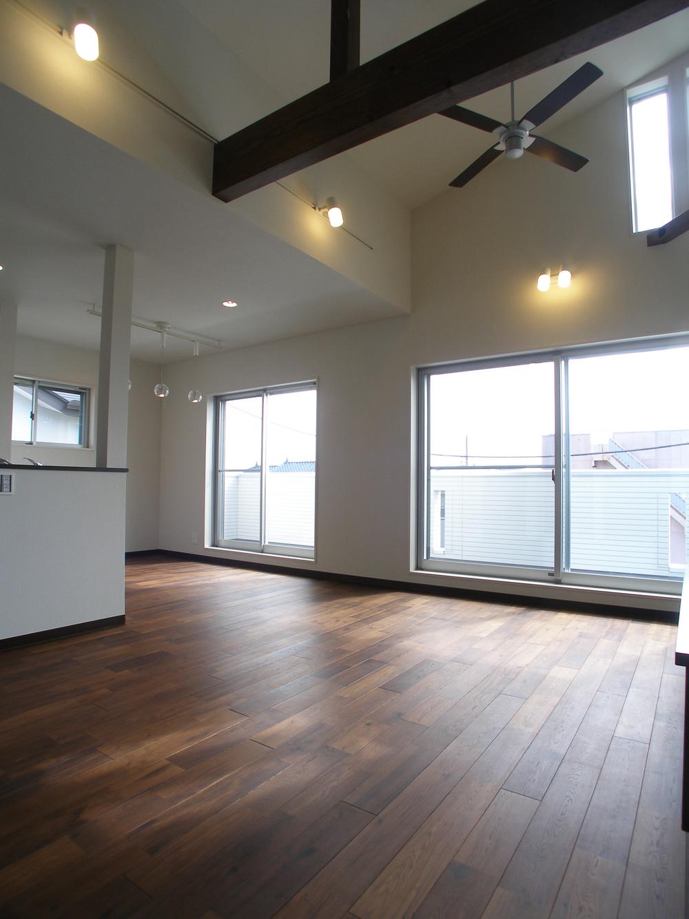 Building plan example (introspection photo). Spacious living room of the slope ceiling