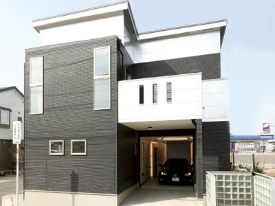 Building plan example (exterior photos). Our construction cases Garage House