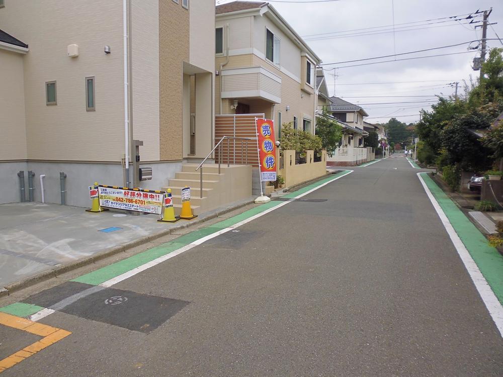 Local photos, including front road. 1 Building