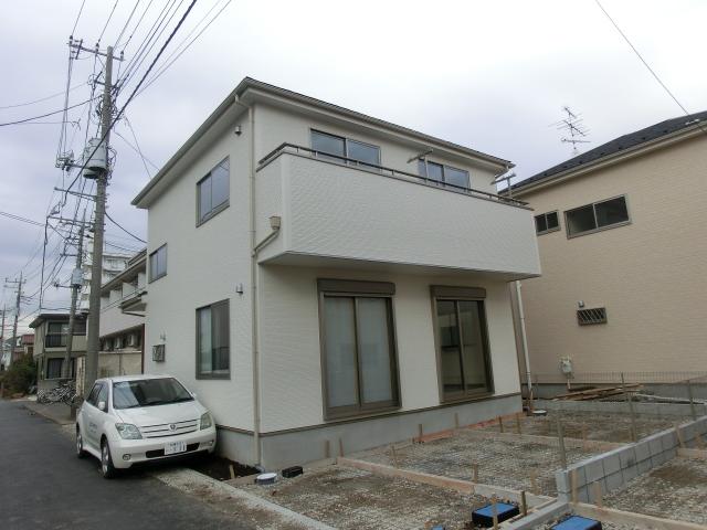 Local photos, including front road. 1 Building