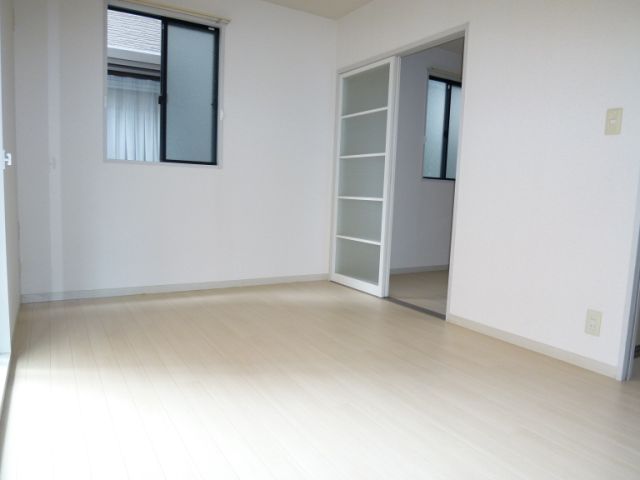 Living and room. Because the corner room is a window it is often the room