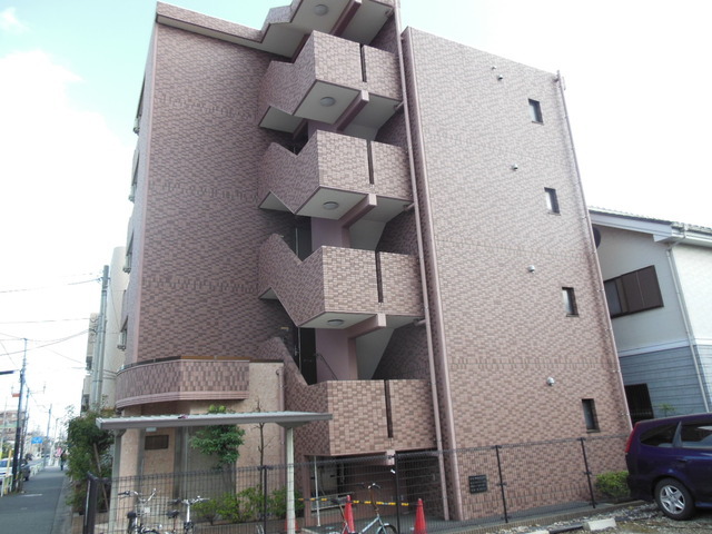 Building appearance. A flat from the station, It is also a pleasant street at night