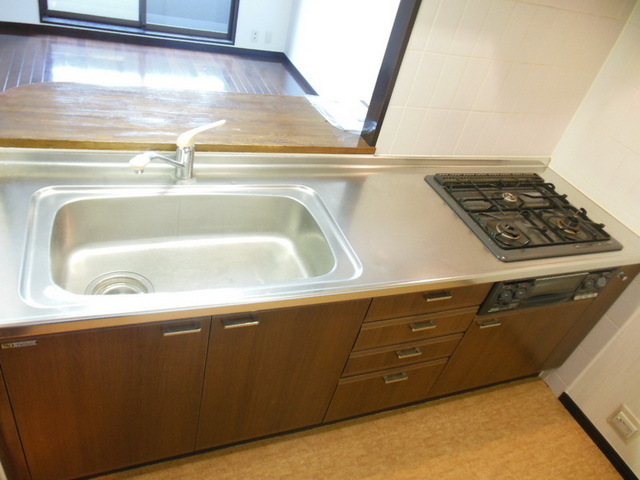 Kitchen. 3 is a neck gas stove system Kitchen