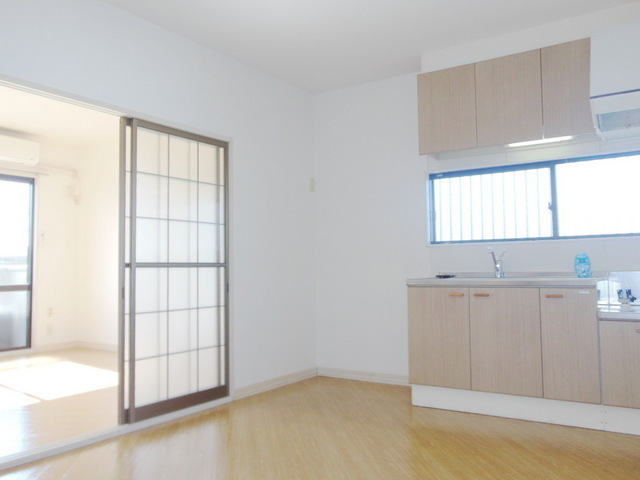 Living and room. It is spread in the room