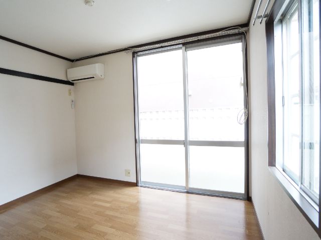 Living and room. With room air conditioning